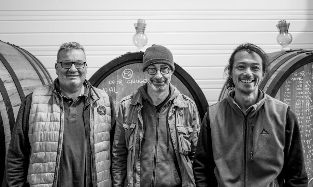 The founders and winemakers of French natural wine brand O2Y: Oliver Guala, Yves Roy, and Yoshi Kuroda